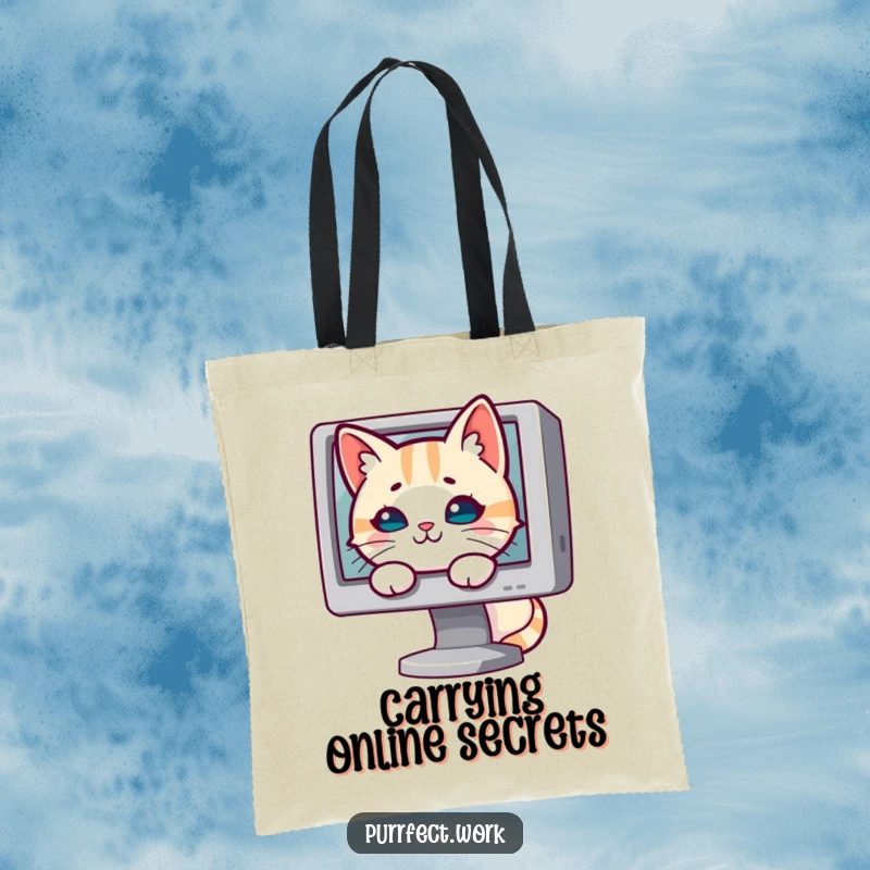 Funny cat tote bag with a cat peeking mischievously from behind a computer monitor, ready for adventure.