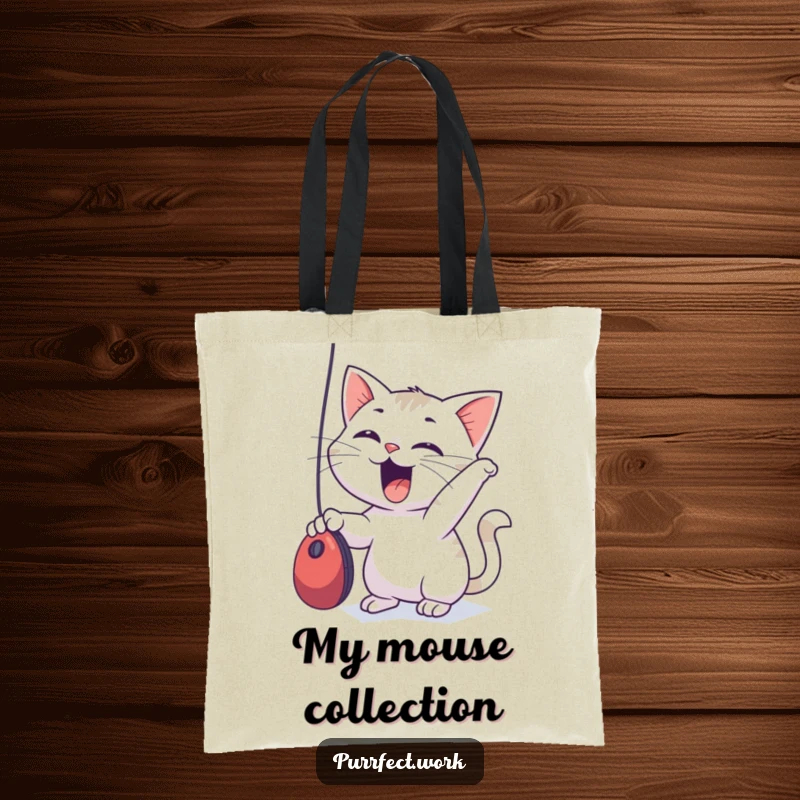 Funny Tote Bag showcasing an excited cat intensely focused on batting a dangling computer mouse, practical and cute.